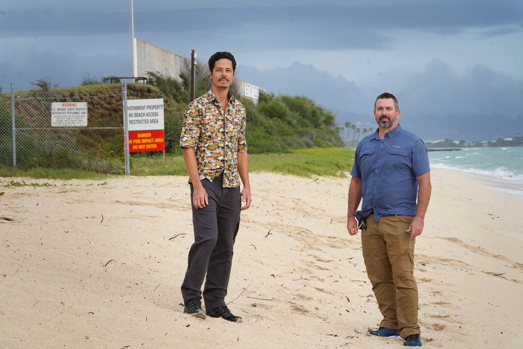 Ewa Beach neighborhood board members Liam Chinn, from left, and Alex Gaos are photographed at Puuloa Beach Park Monday, Jan. 8, 2024, in Ewa Beach. The public beach park and civilian homes border the military’s Puuloa Range Training Facility. (Kevin Fujii/Civil Beat/2024)