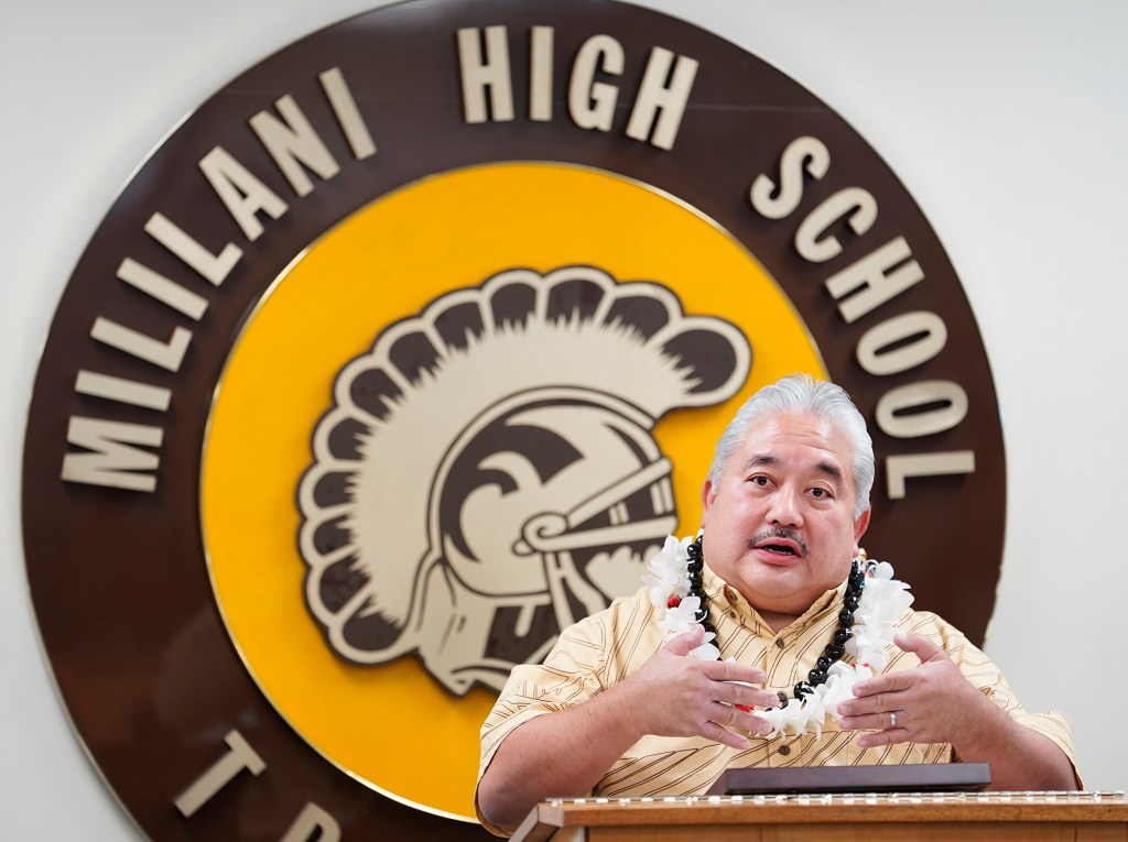Superintendent Keith Hayashi speaks during the Mililani High School celebration of winning the inaugural Hawaiʻi Schools of Democracy award Friday, Jan. 5, 2024, in Mililani. Along with Mililani, Maui High School was also recognized. It honors schools which teach students to be informed on current events, history and engage in the civic and democratic process. (Kevin Fujii/Civil Beat/2024)
