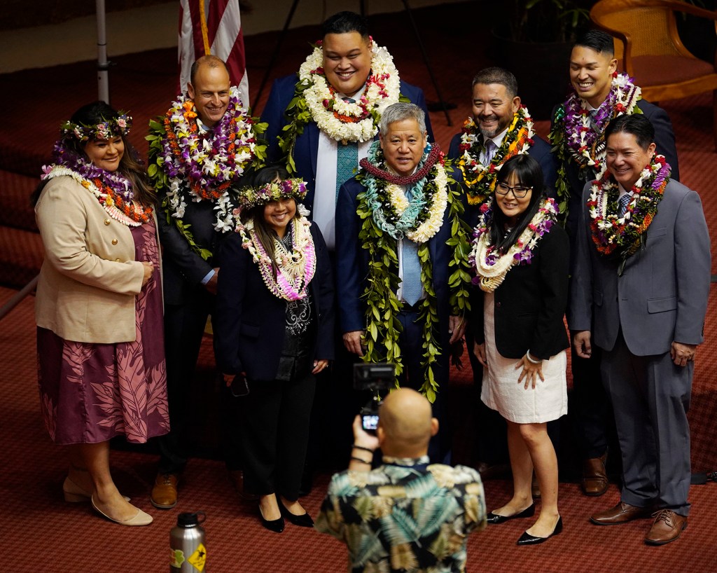 House of Representatives members take a group picture with speaker Scott Saiki during the opening of the legislative session Wednesday, Jan. 17, 2024, in Honolulu. (Kevin Fujii/Civil Beat/2024)