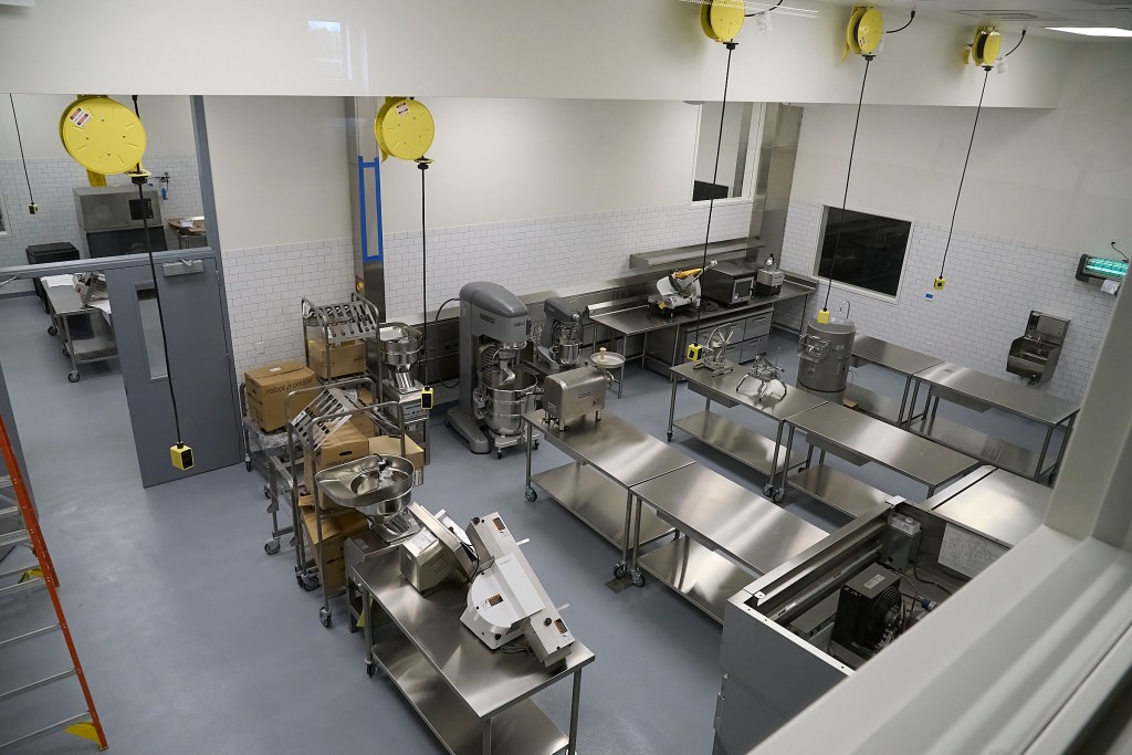 Part of the working commercial kitchen space shown from above