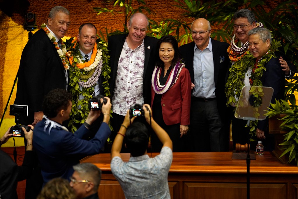 Maui Mayor Richard Bissen, from left, Gov. Josh Green,  Hawaii Mayor Mitch Roth, Lt. Gov. Sylvia Luke, Honolulu Mayor Rick Blangiardi, Senate President Ron Kouchi and House of Representatives Speaker Scott Saiki pose for a group photo after Gov. Green’s state of the state address Monday, Jan. 22, 2024, in Honolulu. (Kevin Fujii/Civil Beat/2024)