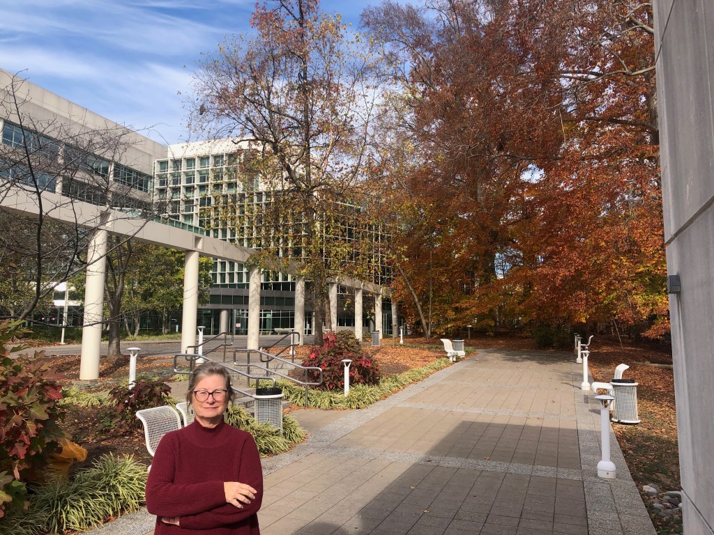 Reporter Kirsten Downy stands in front of the National Archive building in DC
