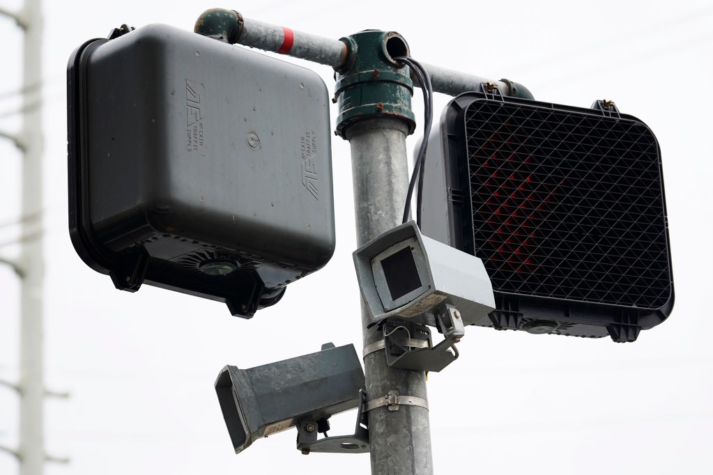 Cameras watch the intersection of Salt Lake Boulevard and Kamehameha Highway Thursday, Feb. 1, 2024, in Aiea. Stock photo of security cameras. (Kevin Fujii/Civil Beat/2024)