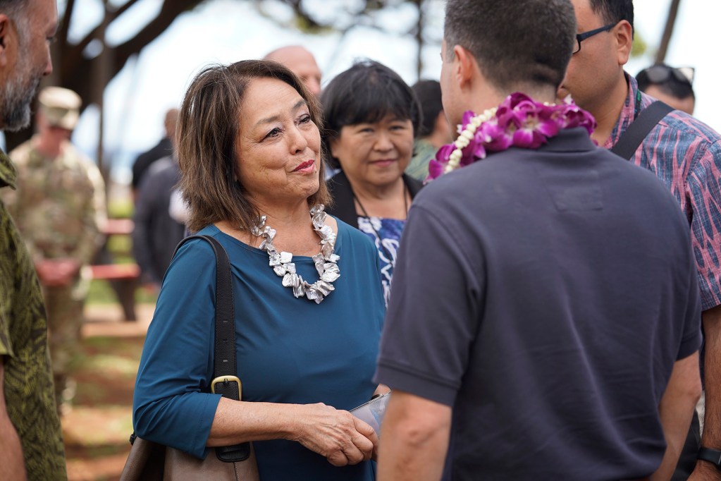 Maui County Council member vice-chair Yuki Lei Sugimura talks with Transportation Secretary Pete Buttigieg on Wednesday, Feb. 21, 2024, in Lahaina. (Kevin Fujii/Civil Beat/2024)