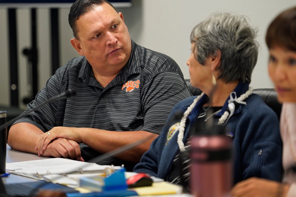 Senator Kurt Favella reacts to fellow Senate committee on higher education committee member Michelle Kidani during a confirmation hearing for University of Hawaii Board of Regents Tuesday, Feb. 27, 2024, in Honolulu. (Kevin Fujii/Civil Beat/2024)