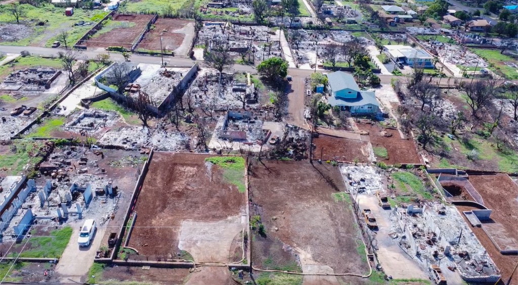 Several properties along Malanai Street and Wahikuli Road, located in the northern section of the Lahaina burn zone, have been cleared of fire debris by contractors with the U.S. Army Corps of Engineers. (Cammy Clark/Civil Beat/2024)