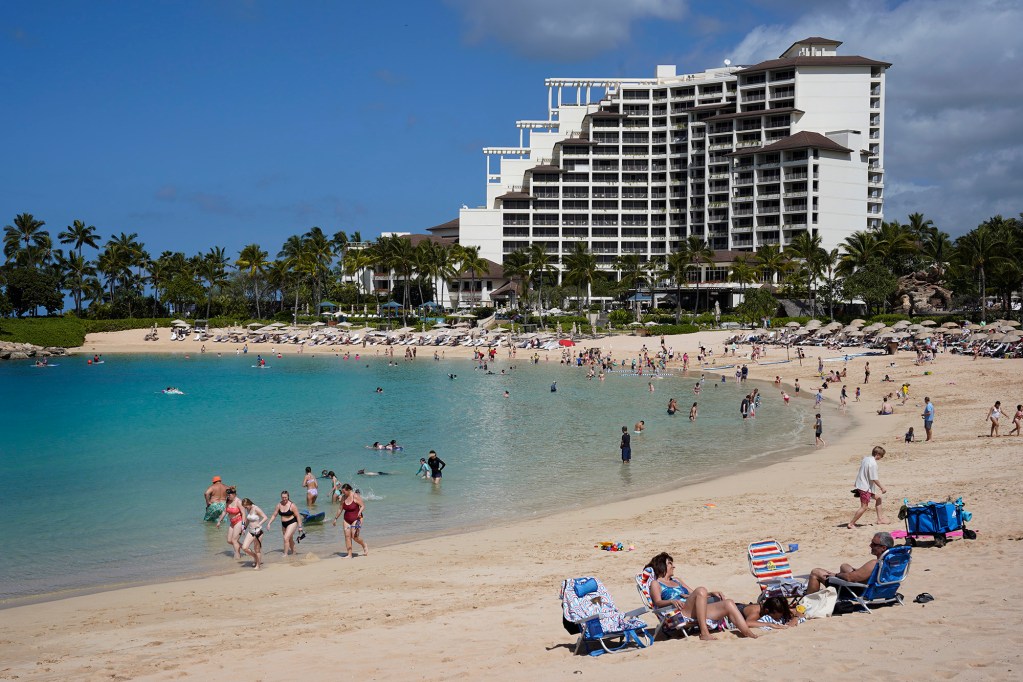 Tourists enjoy the Koolina Lagoon 1 Tuesday, March 12, 2024, in Kapolei. Resorts including the Disney Aulani cater to tourists in West Oahu. (Kevin Fujii/Civil Beat/2024)