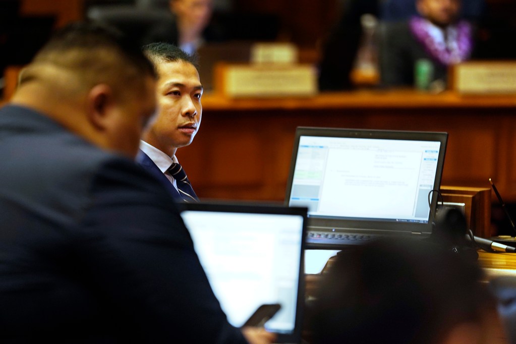 Rep. Adrian Tam listens to comments during the House of Representatives discussion on state budget HB1800 HD1 Wednesday, March 13, 2024, in Honolulu. The House of Representatives voted to pass its third reading to cross over to the senate. (Kevin Fujii/Civil Beat/2024)