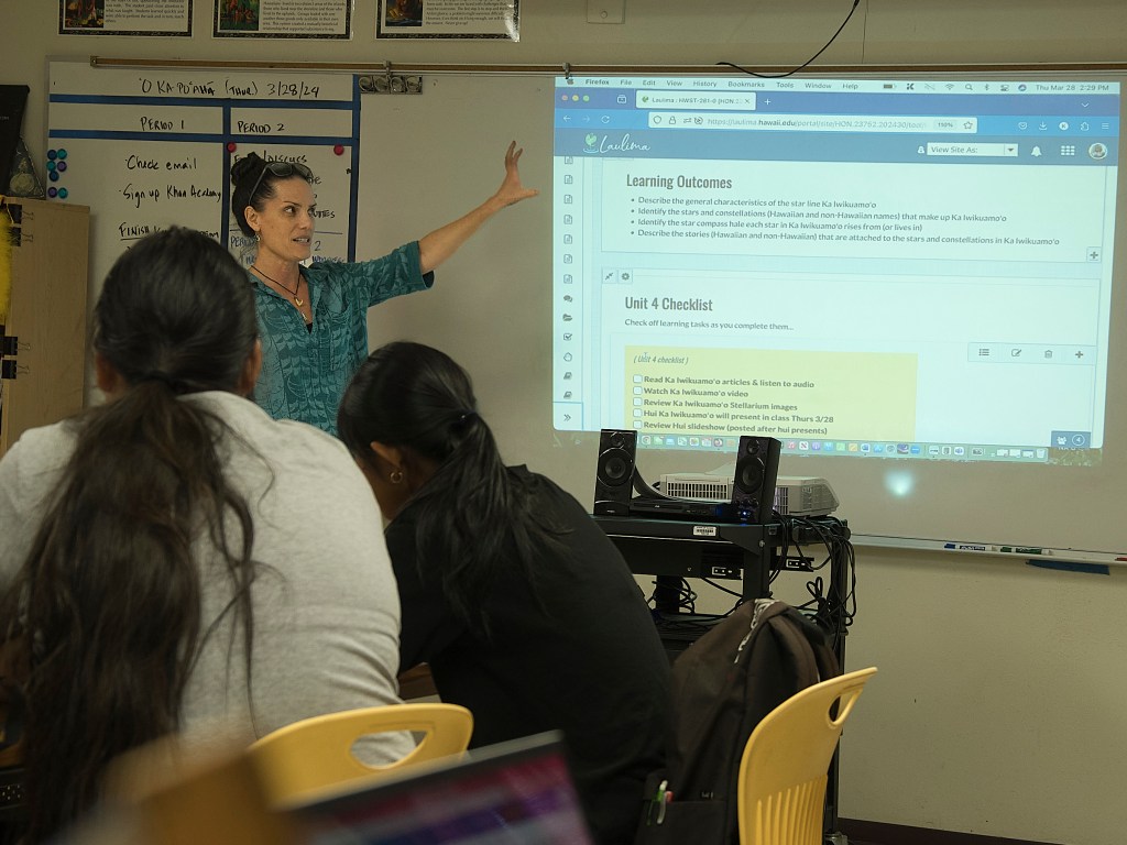 Kaiulani Murphy teachers a pre college class on using stars and the astrological signs in navigational methods to students at Farrington High School. (David Croxford/Civil Beat/2024