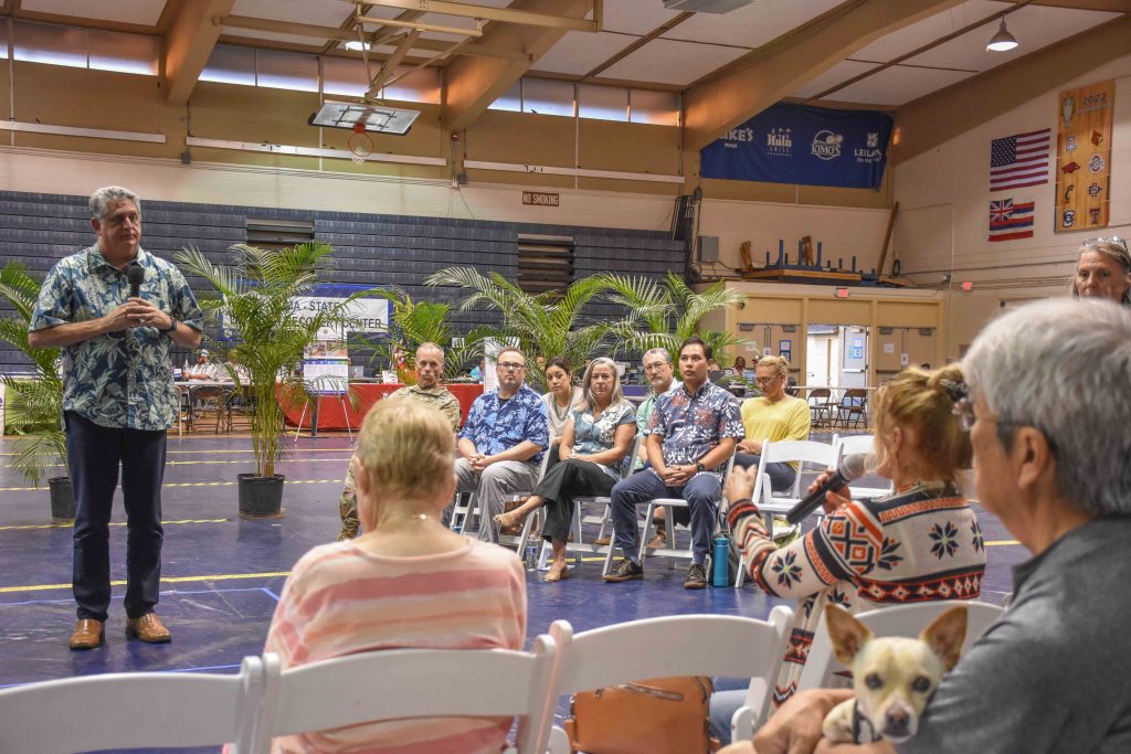 Joe Campos, deputy director of the state Department of Human Services, told the people at the fire recovery meeting at the Lahaina Civic Center that the state was building a temporary housing site with 450 units for fire survivors who were ineligible for FEMA assistance. (Cammy Clark/Civil Beat/2024)