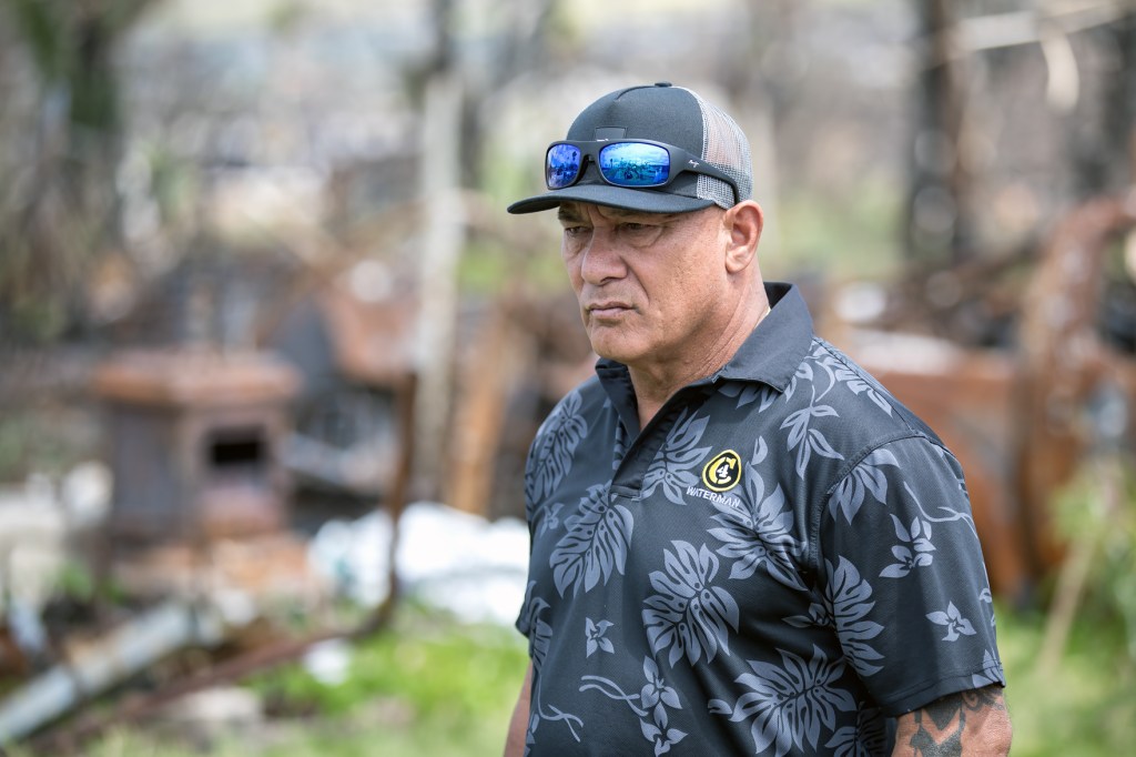 Archie Kalepa walks through the burn zone in Lahaina, March 12, 2024. (Nathan Eagle/Civil Beat/2024)