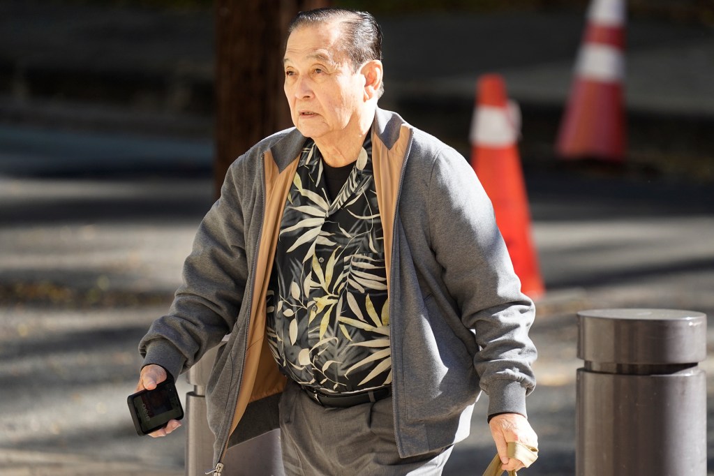 Dennis Mitsunaga arrives at the federal courthouse Wednesday, April 17, 2024, in Honolulu. From Christian Jedra’s April 15, 2024, story, “Businessman Dennis Mitsunaga and several of his associates are charged with conspiring to bribe former Honolulu prosecuting attorney Keith Kaneshiro, who is also charged in the case. Mitsunaga and his colleagues allegedly steered tens of thousands of campaign dollars to Kaneshiro’s campaign so he would pursue a meritless prosecution against a former Mitsunaga employee, Laurel Mau.” (Kevin Fujii/Civil Beat/2024)