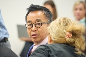 Glenn Wakai chats with Lynne DeCoite, before a committee hear for the financing of Bills
(David Croxford/Civil Beat/2024)