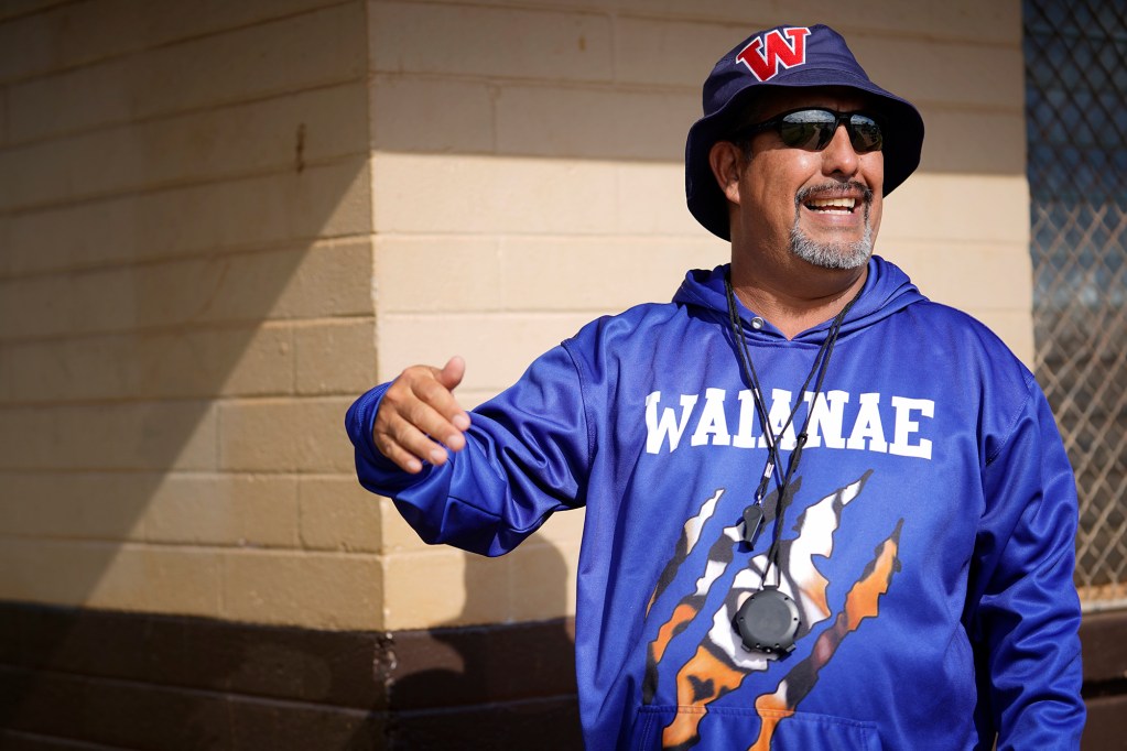 Coach Kenny Johnson talks about reserving practice time at Maili Community Park Thursday, May 2, 2024, in Waianae. (Kevin Fujii/Civil Beat/2024)