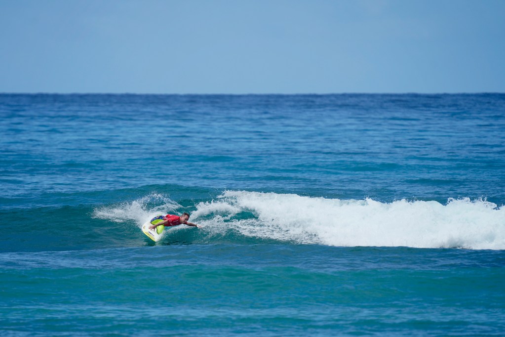 Mark “Mono” Stewart cuts back during his 2024 Hawaii Adaptive Surfing Championships Any Knee Kneeling round at Queens surf break Tuesday, May 13, 2024, in Honolulu. (Kevin Fujii/Civil Beat/2024)