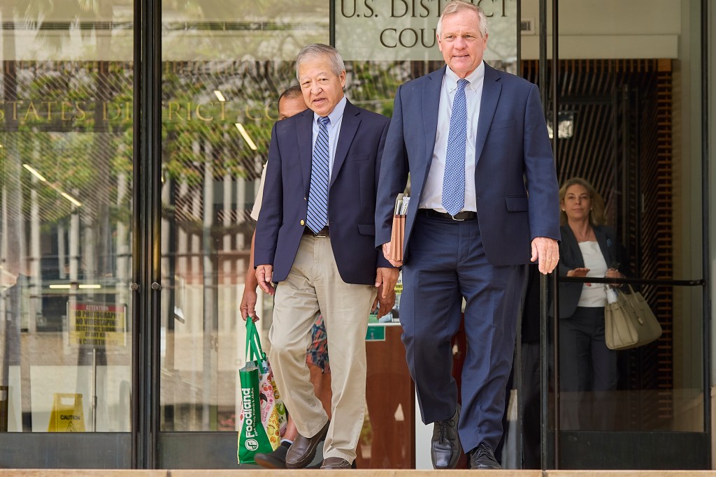 Following the Not Guilty verdict in the Kaneshiro/Mitsunaga et al bribery trial most of the defendants appeared outside the courthouse to speak with local press. (David Croxford/Civil Beat/2024)
