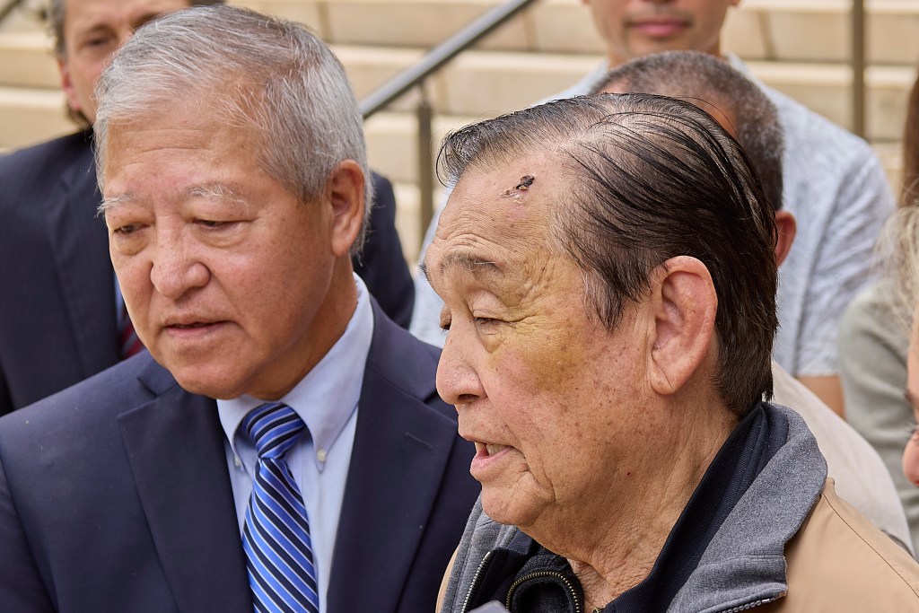 Following the Not Guilty verdict in the Kaneshiro/Mitsunaga et al bribery trial most of the defendants appeared outside the courthouse to speak with local press. (David Croxford/Civil Beat/2024)