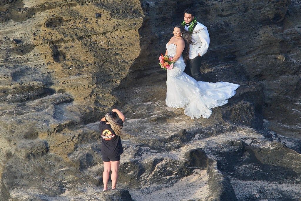 Sunrise wedding photographer at Halona Beach Cove AKA Cockroach Cove or Bay, photographed June 3rd, 2024. (David Croxford/Civil Beat/2024)