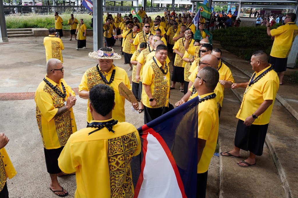 American Samoa delegates gather to enter the 13th Festival of Pacific Arts & Culture opening ceremony Thursday, June 6, 2024, in Honolulu. Known as FestPac for short, takes place every four years, however, missing the last event because of COVID. (Kevin Fujii/Civil Beat/2024)