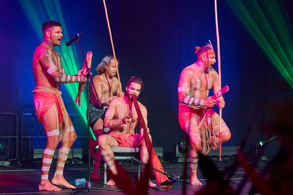 At the Festival Village stage at the Hawaii Convention Center, contingents from countries within Oceana shared their cultural stories through dance and music. Here the Australian group performed for a large crowd. (David Croxford/Civil Beat/2024)