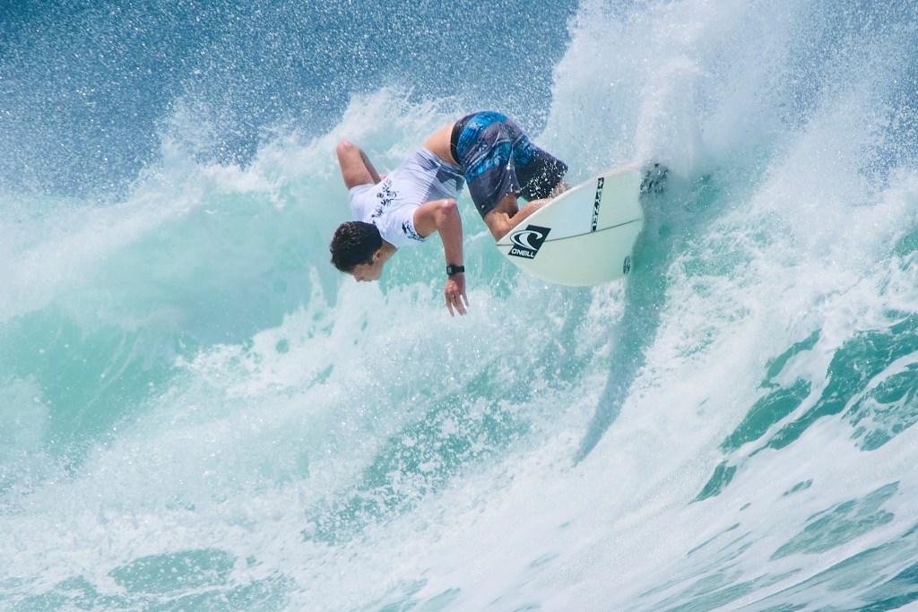 The Rip Curl Surf Into Summer surfing event took place at Bowls surf break in Ala Moana Beach Park June 7th-June 10th. Hawaii’s Thatcher Johnson makes an off the lip turn during his 8th round heat on Monday morning June 10th. David Croxford/Civil Beat/2024