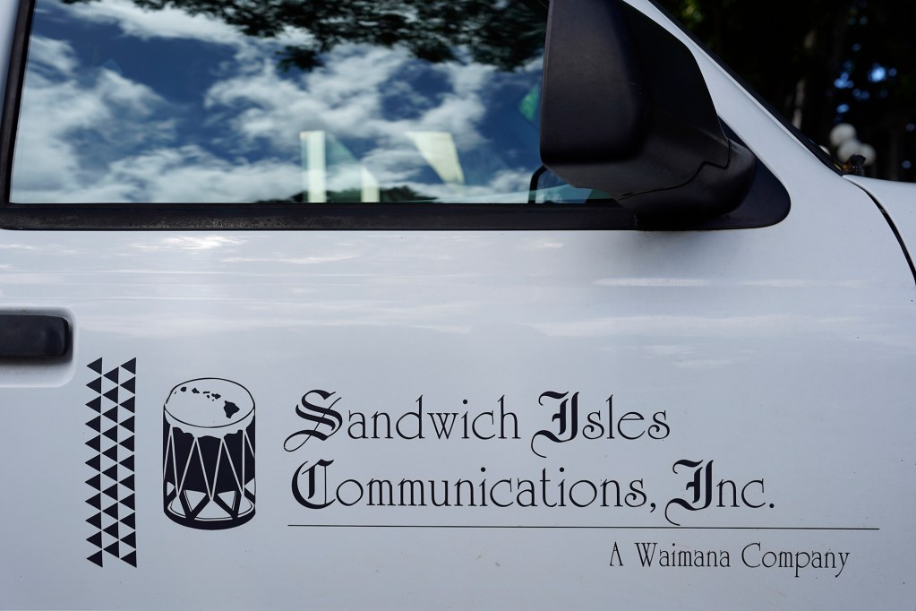 A Sandwich Isles Communications vehicle sits outside of the Kekuanaoa Building Monday, June 17, 2024, in Honolulu. (Kevin Fujii/Civil Beat/2024)