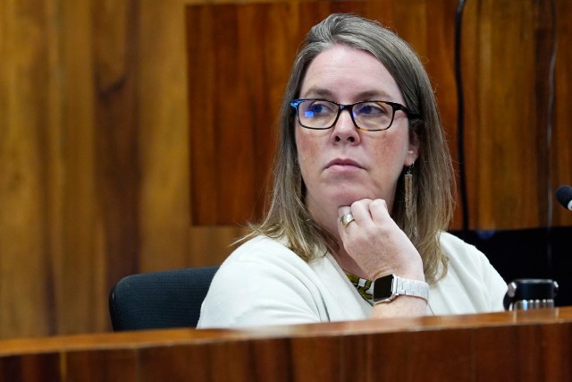 Planning Director Kate Blystone looks at data during a Maui Planning Commission meeting to consider abolishing short-term rentals on Tuesday, June 25, 2024, in Wailuku. (Kevin Fujii/Civil Beat/2024)