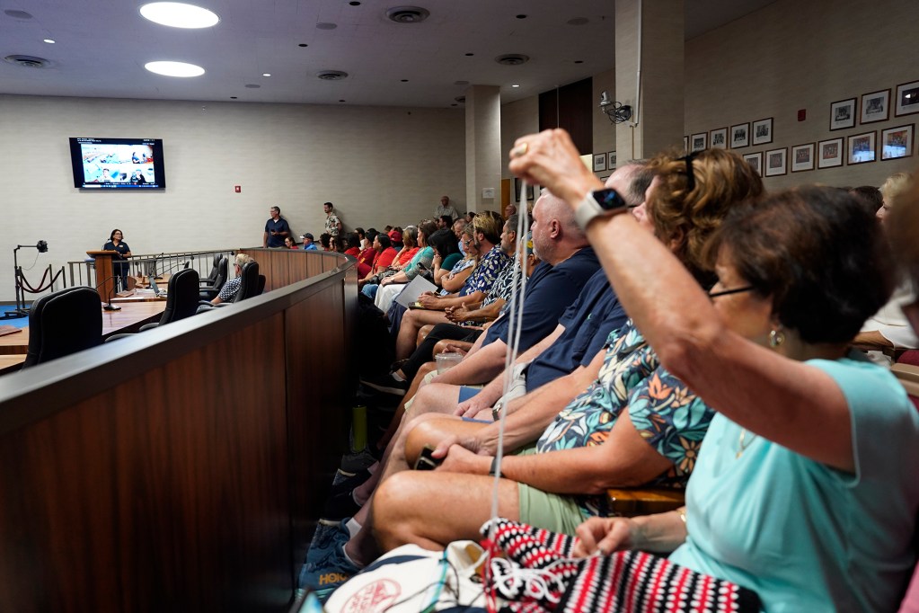 A packed Maui City Council Chambers is filled with supporters and opposers to abolish short-term rentals during the Maui Planning Commission meeting Tuesday, June 25, 2024, in Wailuku. (Kevin Fujii/Civil Beat/2024)
