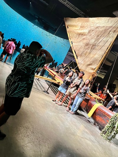 The koa canoe Mauloa was the centerpiece of the individual island group exhibitions at Hawai'i Convention Center in Honolulu. (Naka Nathaniel/Civil Beat/2024)