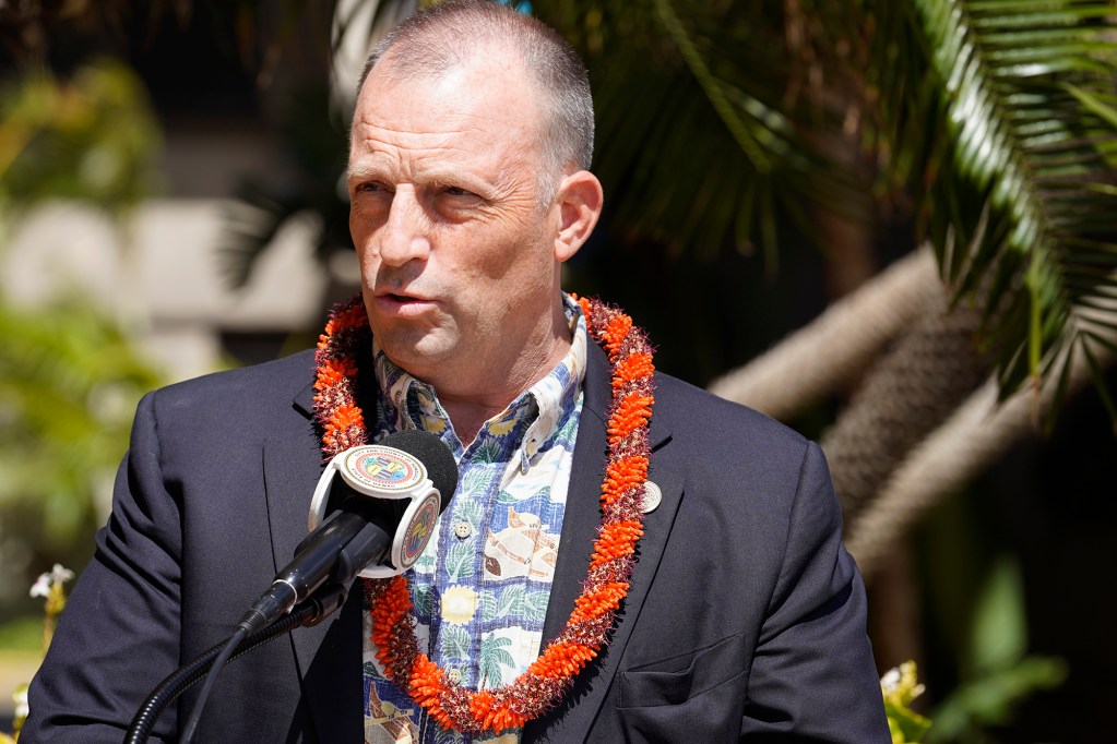 Gov. Josh Green announces new affordable housing and beds to help alleviate the homeless issue at Waikiki Vista on Friday, July 5, 2024, in Honolulu. The 19-story building will house an emergency shelter, transitional family housing and studio apartments. (Kevin Fujii/Civil Beat/2024)