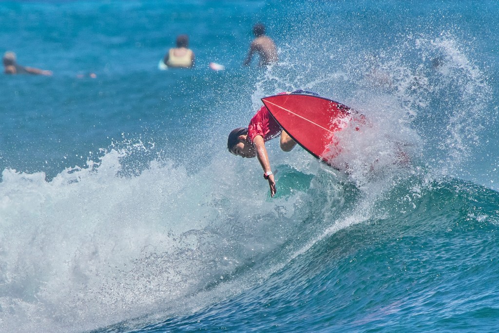 On Tuesday and Wednesday Nike Swim hosted the inaugural Honua Finals: The World Cup of Interscholastic Surfing that brought High School surfers from Hawaii, the Mainland and New Zealand together at Ala Moana Bowls to compete in the first Scholastic International surfing competition. (David Croxford/Civil Beat/2024)