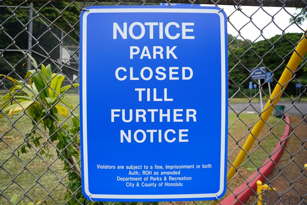 A closed sign at Moanalua Valley Neighborhood Park is photographed Thursday, July 11, 2024, in Honolulu. (Kevin Fujii/Civil Beat/2024)