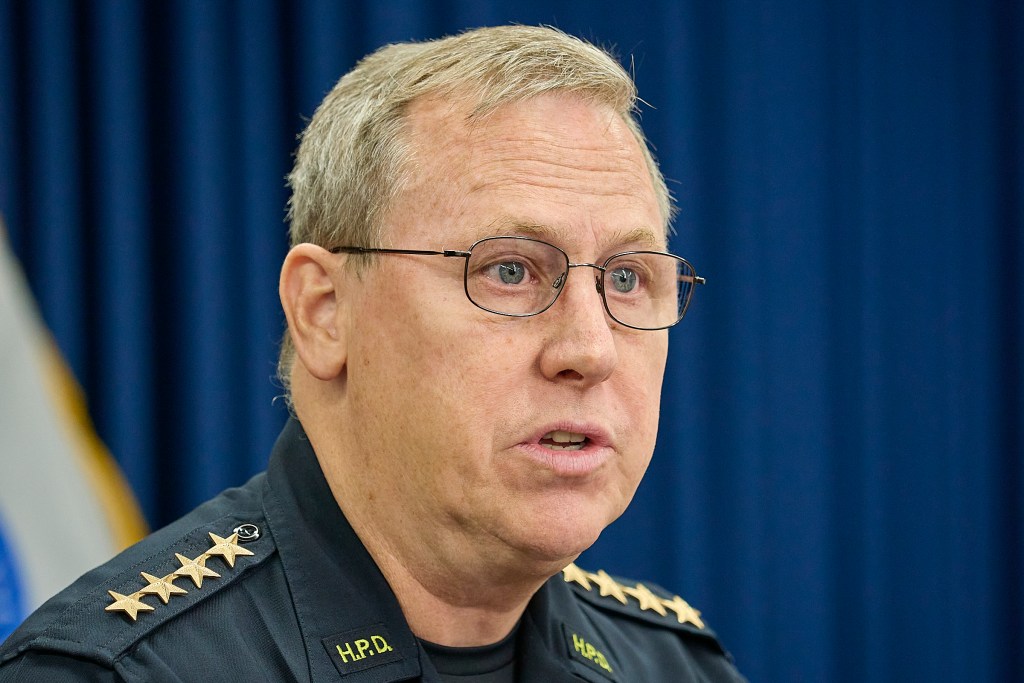 HPD Chief Joe Logan reports information of the fatal Police shooting at 2509 Ala Wai Blvd. The barricaded victim came out of the apartment brandishing a gun and pointed toward officers after non lethal canisters containing CS gas were deployed. The officers returned fire and fatally wounded the suspect who was believed to be the culprit in three earlier robberies.(David Croxford/CivilBeat/2024)