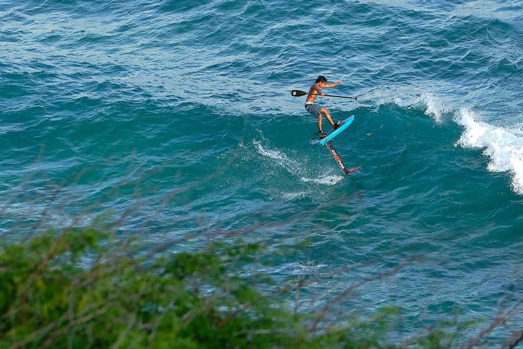 At Diamond Head Surf Break on Oahu's south shore, surfers of different ilks took advantage of the small waves to improve their skills. Foil Surfing and Kite surfing both require a deeper investment in equipment to allow for skilled improvements. Photo graphed July 21st, 2024 (David Croxford/Civil Beat/2024)