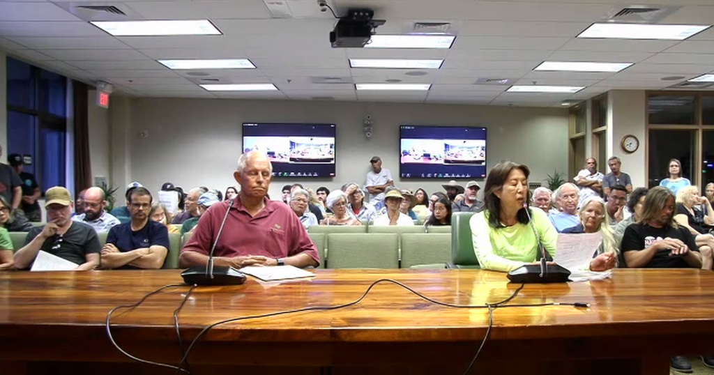 Eric Weinert and Kanoi Daud testifying at a Jul. 19 hearing on the Hawaii County Finance Director's proposed rules for Bills 57 and 58.