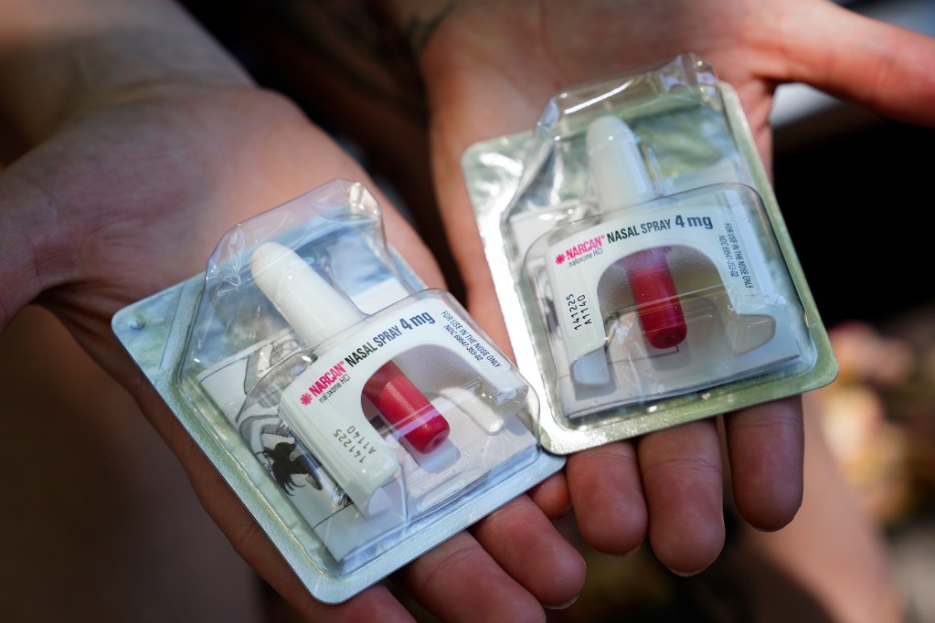 Health and Harm Reduction Center’s SEP Syringe Exchange Program) Outreach Worker Rain Stewart shows Civil Beat a couple of Narcan nasal sprays Tuesday, Aug. 13, 2024, in Honolulu. Health and Harm Reduction Center created a new partnership with Emergency Medical Services (EMS) to provide outreach for patients who overdose on illicit drugs. (Kevin Fujii/Civil Beat/2024)