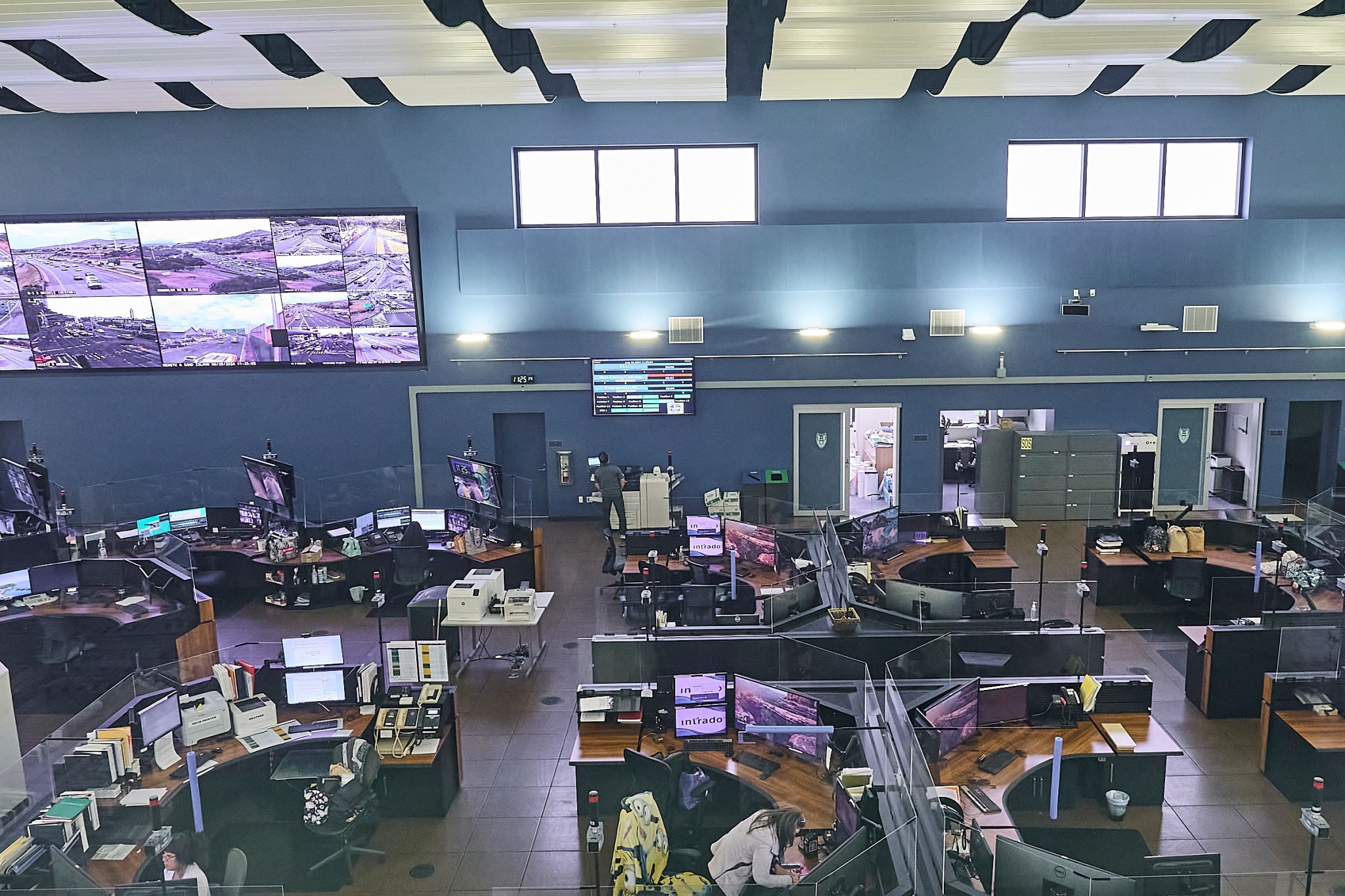 At the Honolulu Joint Traffic Management Center on Thursday August 29th, 2024 Captain Matthew Kurihara of the HPD Communications division shared details of a 911 enhancement that will begin operation on Oahu on September 5th, 2024.  Honolulu 911 system currently receives up to 1 million 911 calls a year. Approx 10-12,000 call a month are abandoned calls or disconnected calls but because of the emergency nature of the call all calls must be followed up on. This new automated system will help to alleviate any backlog within the system.(David Croxford/Civil Beat/2024
