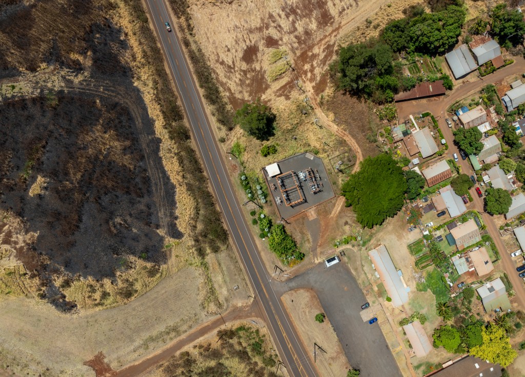Birds Eye view of the North-East corner of Kaumakani Village in South Kauai where a burn scar show the grave proximity in which a wildfire came in mid-July.