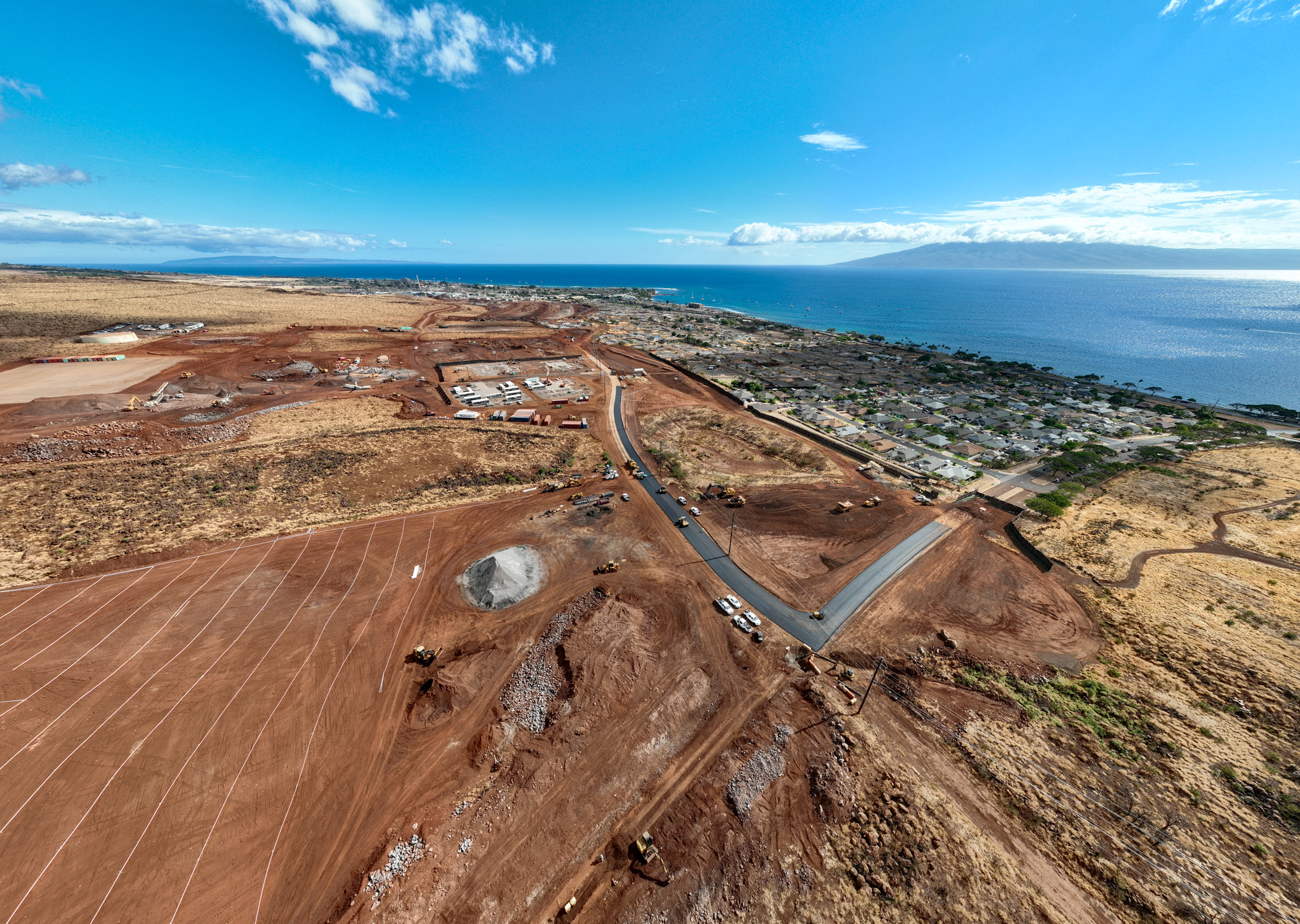 A boat maneuvers in Lahania Harbor Thursday, Aug. 10, 2023, in Lahaina. The historical town was destroyed by a wildfire Tuesday night. (Kevin Fujii/Civil Beat/2023)