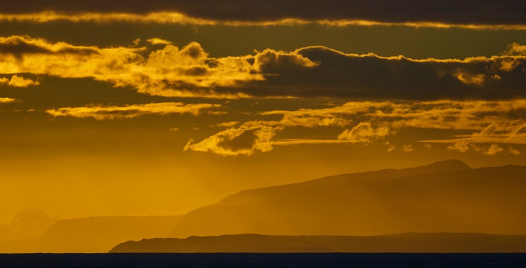 Even an eclipse can be thwarted by local weather as it was October 2nd 2024 on the eastern end of Oahu. But while the sun had ducked behind a large cloud bank 3 minutes before reaching its peak two of the neighbor islands could be seen across the Kaiwi channel, Molokai and Lanai showed themselves in the early morning light(David Croxford/Civil Beat/2024)