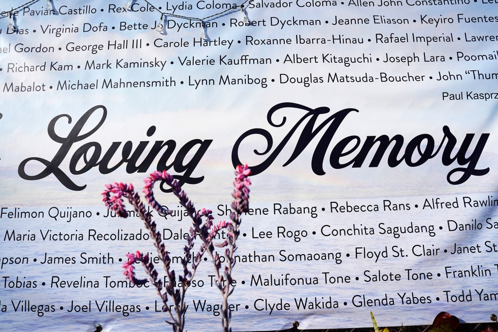 A banner with names of those remembered at the Lahaina memorial is photographed Wednesday, Oct. 2, 2024, in Lahaina. The Aug. 8, 2023, fire destroyed the West Maui historic town of Lahaina and killed 102 people. (Kevin Fujii/Civil Beat/2024)