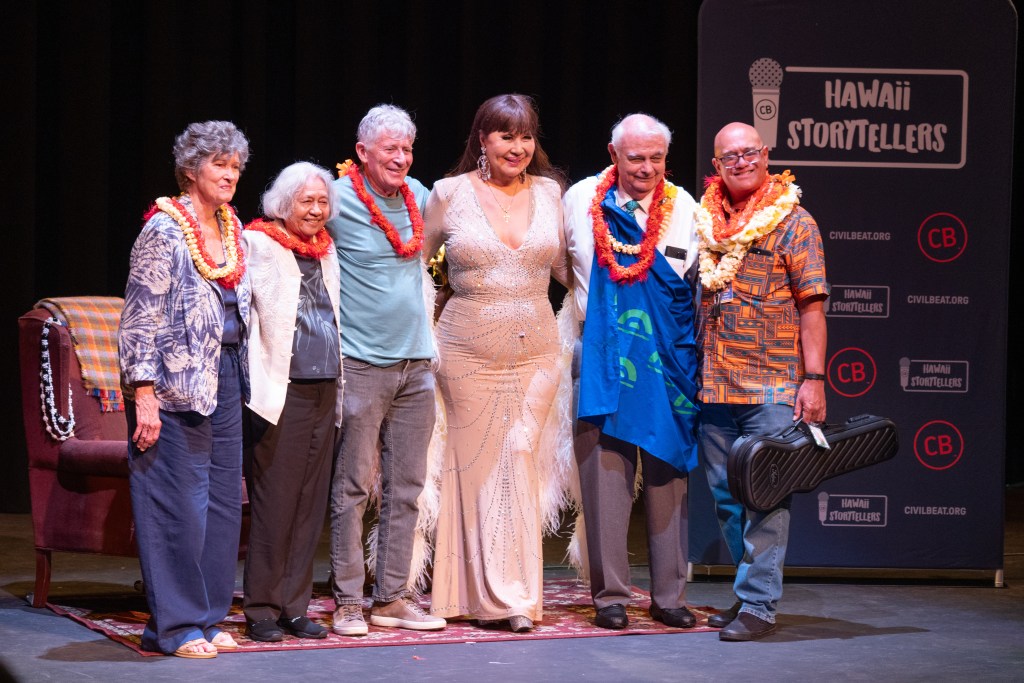 Storytellers gather on stage for a photo concluding a Civil Beat hosted event.
