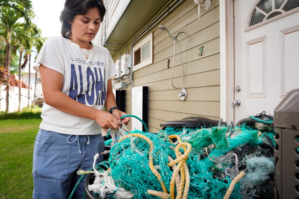 Michiko Smith creates art with rubbish she collects from the ocean Tuesday, Oct. 29, 2024, in Kehei. (Kevin Fujii/Civil Beat/2024)