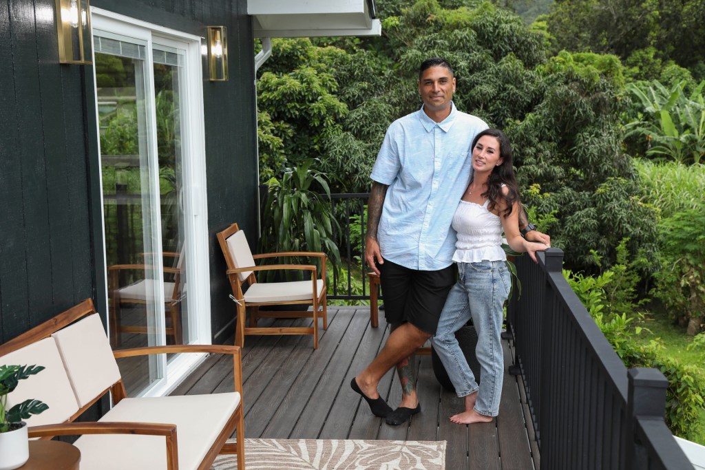 Kamohai (left) and Tristyn (right) pictured on the new deck area of the "Carjacks House" in Renovation Aloha