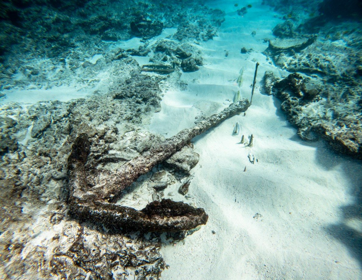 An anchor from the 19th century British ship the Hermes remains near the site where it ran aground in 1822, one of the artifacts protected in Papahanaumokuakea Marine National Monument. (Nathan Eagle/Civil Beat/2024)