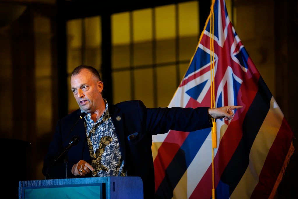Hawaii Gov. Josh Green points to the election results during his speech at the Democrat election night watch party Tuesday, Nov. 5, 2024, in Honolulu. (Kevin Fujii/Civil Beat/2024)