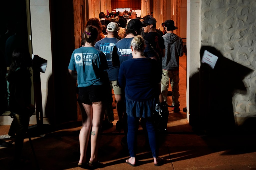The final turn before getting into he hallway leading to the voting machines at Kapolei Hale is deceptively shorter than the line which wraps around the building and then snakes around itself Tuesday, Nov. 5, 2024, in Kapolei. (Kevin Fujii/Civil Beat/2024)