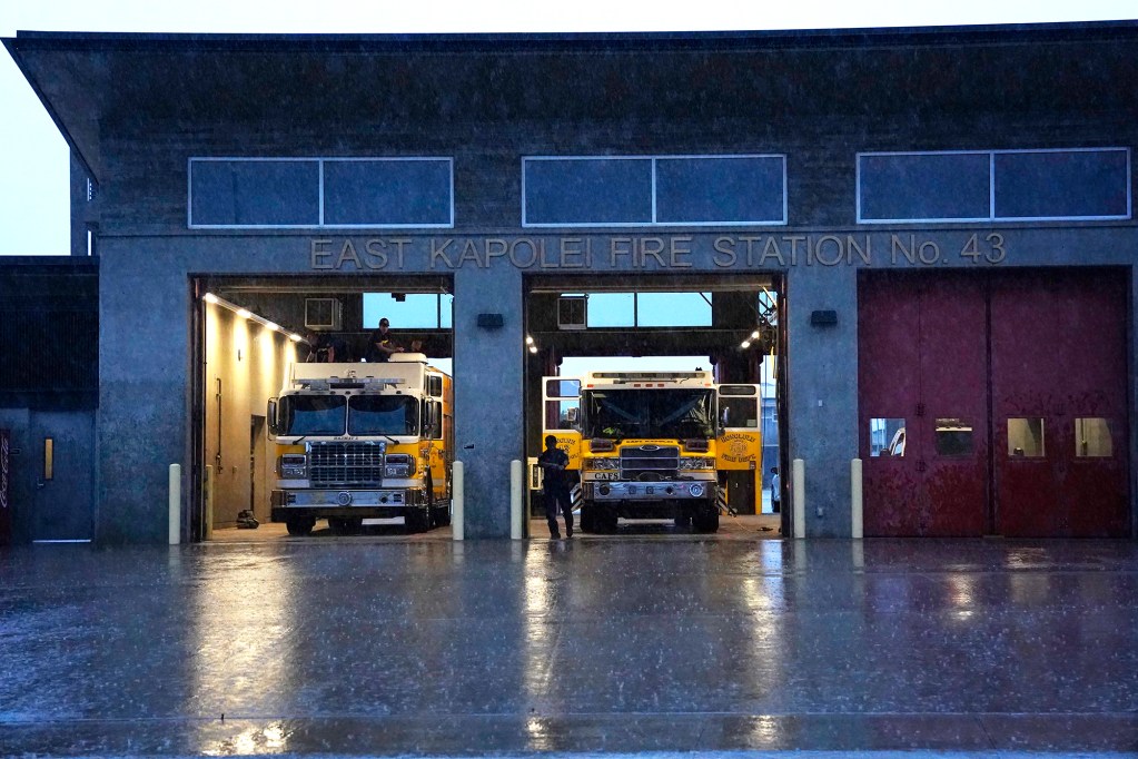 East Kapolei Firefighters at station 43 wash their vehicles on a rainy Tuesday, Nov. 5, 2024, in Kapolei. (Kevin Fujii/Civil Beat/2024)