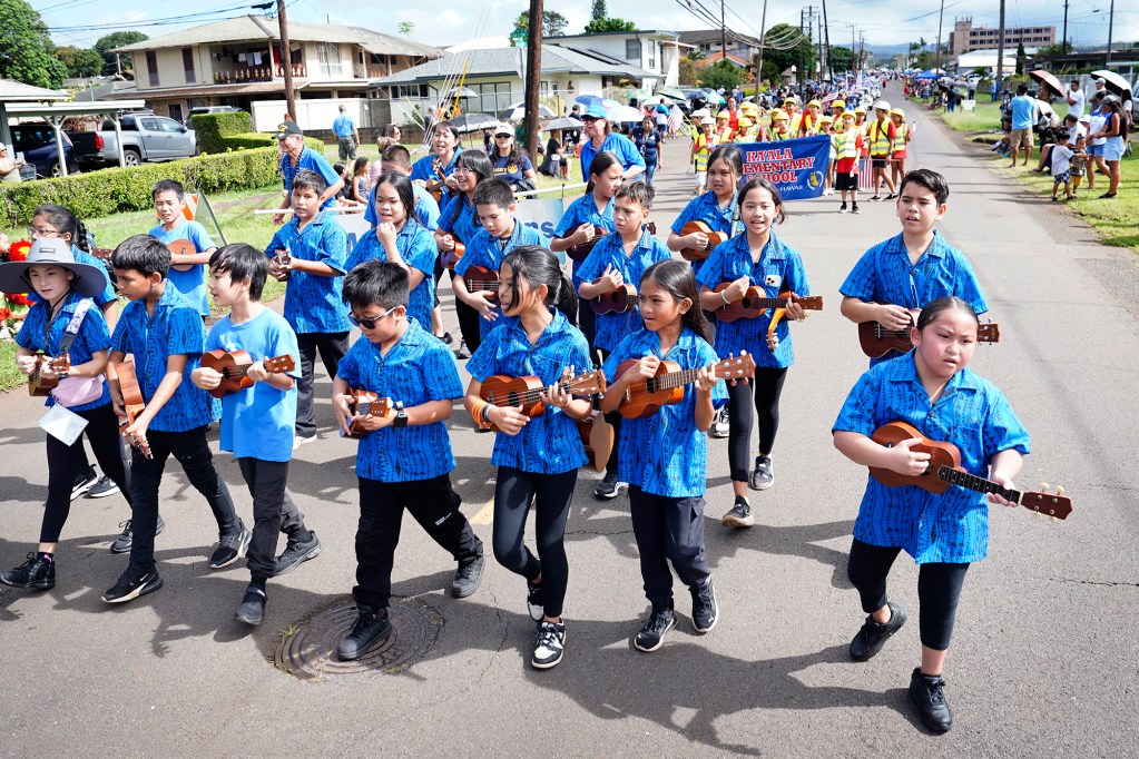 Iliahi Elementary School ukulele players perform in the 78th Wahiawa Lions Veterans Day Parade Monday, Nov. 11, 2024, in Wahiawa. (Kevin Fujii/Civil Beat/2024)