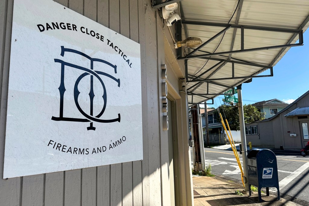 The storefront for Danger Close Tactical, a federally licensed firearms dealer, is seen in a Honolulu neighborhood Thursday, Nov. 21, 2024. (AP Photo/Jennifer Sinco Kelleher)